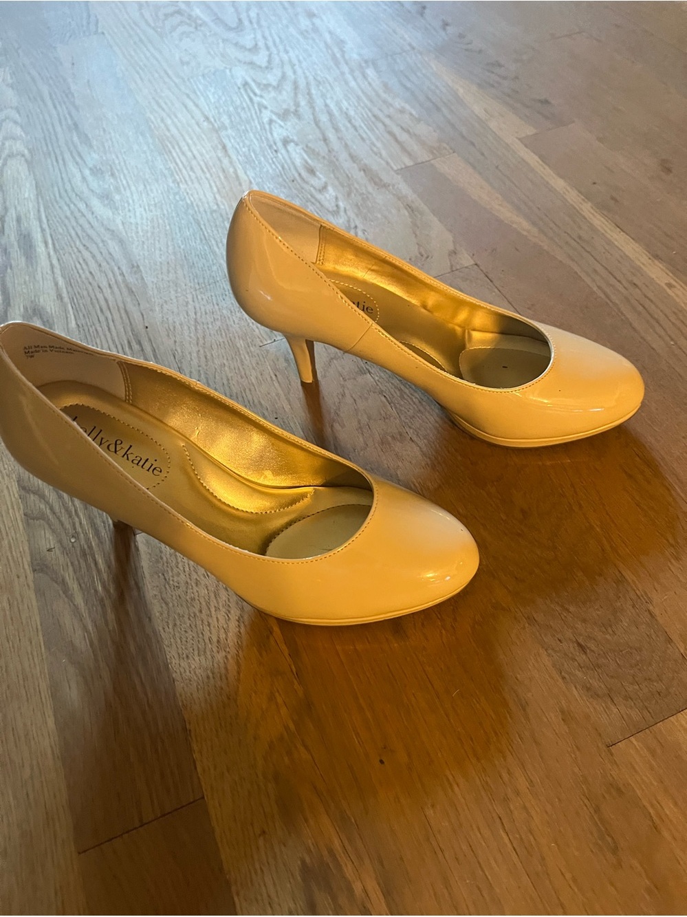 Women’s Kelly & Katie Nude Patent Pumps.